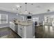 Open concept kitchen flows into a living area with lots of natural light and backyard access at 1586 Innkeeper Ln, Johns Island, SC 29455