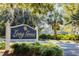 Entrance sign for Long Grove, with lush landscaping and trees at 1600 Long Grove Dr # 1226, Mount Pleasant, SC 29464