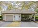 Property's garage with covered area with room for parking at 1600 Long Grove Dr # 1226, Mount Pleasant, SC 29464