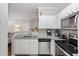 Clean and modern kitchen featuring granite countertops and stainless steel appliances at 1600 Long Grove Dr # 1226, Mount Pleasant, SC 29464