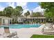 This resort-style pool offers plenty of deck space, palm trees, and lounge chairs for relaxing in the sun at 1600 Long Grove Dr # 1226, Mount Pleasant, SC 29464