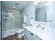 Modern bathroom showcasing a glass enclosed shower and stylish vanity with a framed mirror at 1725 W Avalon Cir, Charleston, SC 29407