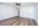 Bedroom with hardwood floors and closet with doors at 1725 W Avalon Cir, Charleston, SC 29407