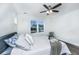 Bright bedroom featuring a ceiling fan, natural light, and wood-look flooring at 1725 W Avalon Cir, Charleston, SC 29407