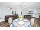 Open-concept layout showcasing the dining area, living room, and modern kitchen, perfect for entertaining at 1725 W Avalon Cir, Charleston, SC 29407