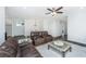 Inviting living room showcasing comfortable seating, neutral tones, and a view into the dining area at 1725 W Avalon Cir, Charleston, SC 29407