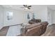 Cozy living area with natural light, comfortable seating, and a welcoming atmosphere for relaxation at 1725 W Avalon Cir, Charleston, SC 29407