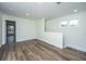 Upstairs loft area with hardwood floors and natural light at 1725 W Avalon Cir, Charleston, SC 29407