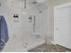 Luxurious walk-in shower with marble tiles, glass doors, and a rainfall showerhead at 1821 Mead Ln, Johns Island, SC 29455