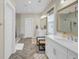 Elegant bathroom with double vanity, quartz countertop, gold fixtures, and frameless glass shower at 1821 Mead Ln, Johns Island, SC 29455