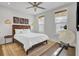 Bright bedroom with natural light, wood floors, and a ceiling fan at 1821 Mead Ln, Johns Island, SC 29455