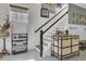 Inviting entryway with staircase and decorative storage at 1821 Mead Ln, Johns Island, SC 29455