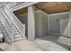 View of the back of the home highlighting a patio area, stairs, and elevated structure at 1821 Mead Ln, Johns Island, SC 29455