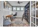 Inviting home office with a large bookcase, a chess table, a ceiling fan, and natural light at 1821 Mead Ln, Johns Island, SC 29455