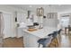 Modern kitchen with stainless steel appliances, a large island with seating, and pendant lighting at 1821 Mead Ln, Johns Island, SC 29455