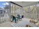 Relax on this porch with a hammock, swing, and cushioned chairs overlooking the yard at 1821 Mead Ln, Johns Island, SC 29455