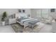 Bright bedroom with a large bed, patterned rug, and matching bedside tables at 189 Belfort Place, Summerville, SC 29486