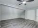 Finished attic bedroom with hardwood floors, a closet and a modern ceiling fan at 2076 Wild Flower Ln, Charleston, SC 29414