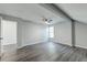 Open bedroom features vinyl floors, ceiling fan, and entrance to another room at 2076 Wild Flower Ln, Charleston, SC 29414