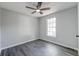Bedroom with LVP floors, ceiling fan, and natural light from window at 2076 Wild Flower Ln, Charleston, SC 29414