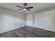 Spacious bedroom with a modern ceiling fan, grey walls and large closet at 2076 Wild Flower Ln, Charleston, SC 29414