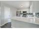 Kitchen with stainless steel appliances and a large counter at 2076 Wild Flower Ln, Charleston, SC 29414
