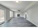 Living room features a brick fireplace and access to the backyard at 2076 Wild Flower Ln, Charleston, SC 29414