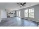 Open-concept living room with a breakfast bar and updated kitchen at 2076 Wild Flower Ln, Charleston, SC 29414