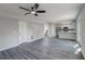 Open-concept living area with a kitchen, and stairs to the second floor at 2076 Wild Flower Ln, Charleston, SC 29414