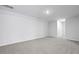 Expansive bedroom features plush gray carpeting, neutral paint, and ample natural light at 2239 Macallan Blvd, Ravenel, SC 29470