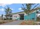 Hillcrest Club clubhouse entrance with partial teal siding and paver pathway at 2239 Macallan Blvd, Ravenel, SC 29470