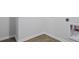 An empty laundry room with wood-look vinyl flooring and white walls at 2239 Macallan Blvd, Ravenel, SC 29470