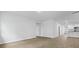 A bright, naturally lit living room with light vinyl flooring and recessed lighting at 2239 Macallan Blvd, Ravenel, SC 29470