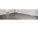 A bright living room with white walls and light vinyl flooring at 2239 Macallan Blvd, Ravenel, SC 29470