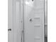 Close-up of the shower, showcasing the sleek design and integrated shelving at 2239 Macallan Blvd, Ravenel, SC 29470