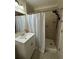 Bathroom featuring a shower stall with a white shower curtain and a modern sink at 260 Carolina Cir, Walterboro, SC 29488