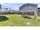 Large backyard with a dining set, providing ample space for outdoor activities at 271 Palmetto Walk Dr, Summerville, SC 29486