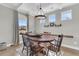 Beautiful dining room featuring a wooden table set, stylish light fixture, and natural lighting at 271 Palmetto Walk Dr, Summerville, SC 29486