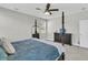 Relaxing main bedroom with a four-poster bed, soft blue bedding, and a wooden dresser at 271 Palmetto Walk Dr, Summerville, SC 29486