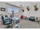 Bright and spacious home office with modern desk, ample storage, and natural light from the large window at 271 Palmetto Walk Dr, Summerville, SC 29486