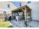 Entertain in style with this outdoor bar featuring a corrugated metal design and TV at 271 Palmetto Walk Dr, Summerville, SC 29486
