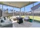 Screened in patio with furniture and string lights at 271 Palmetto Walk Dr, Summerville, SC 29486