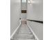 Carpeted staircase with light gray walls and natural lighting at 271 Palmetto Walk Dr, Summerville, SC 29486