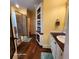 Bathroom with tiled shower and built-in shelving at 2729 Barracada Rd, Walterboro, SC 29488