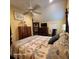 Bedroom featuring a four poster bed frame, natural lighting, and hardwood flooring at 2729 Barracada Rd, Walterboro, SC 29488