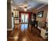 Hardwood flooring with view into the dining area, with bright natural light at 2729 Barracada Rd, Walterboro, SC 29488