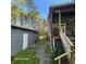 Exterior of a home and detached garage with well-maintained lawn and patio at 2729 Barracada Rd, Walterboro, SC 29488