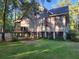 View of the side of the home, highlighting the construction and large yard at 2729 Barracada Rd, Walterboro, SC 29488