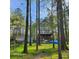 Two-story house with large front yard and multiple outbuildings at 2729 Barracada Rd, Walterboro, SC 29488