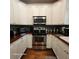Well-lit kitchen with stainless steel appliances and plenty of cabinet space at 2729 Barracada Rd, Walterboro, SC 29488
